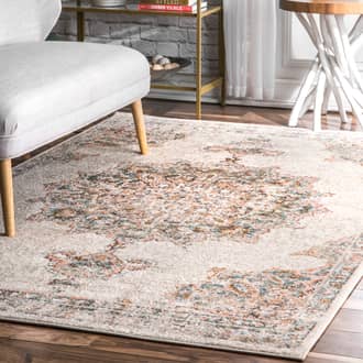 Beige Yesteryear Faded Sun Medallion rug